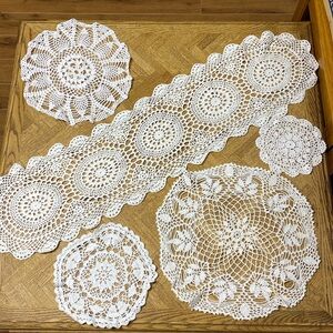 Five vintage handmade lace style doilies